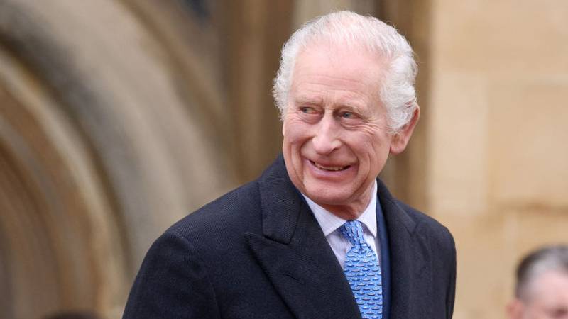 WINDSOR, ENGLAND - MARCH 31: King Charles III smiles as he leaves after attending the Easter Mattins Service at at St. George's Chapel, Windsor Castle on March 31, 2024 in Windsor, England. (Photo by Hollie Adams - WPA Pool/Getty Images)